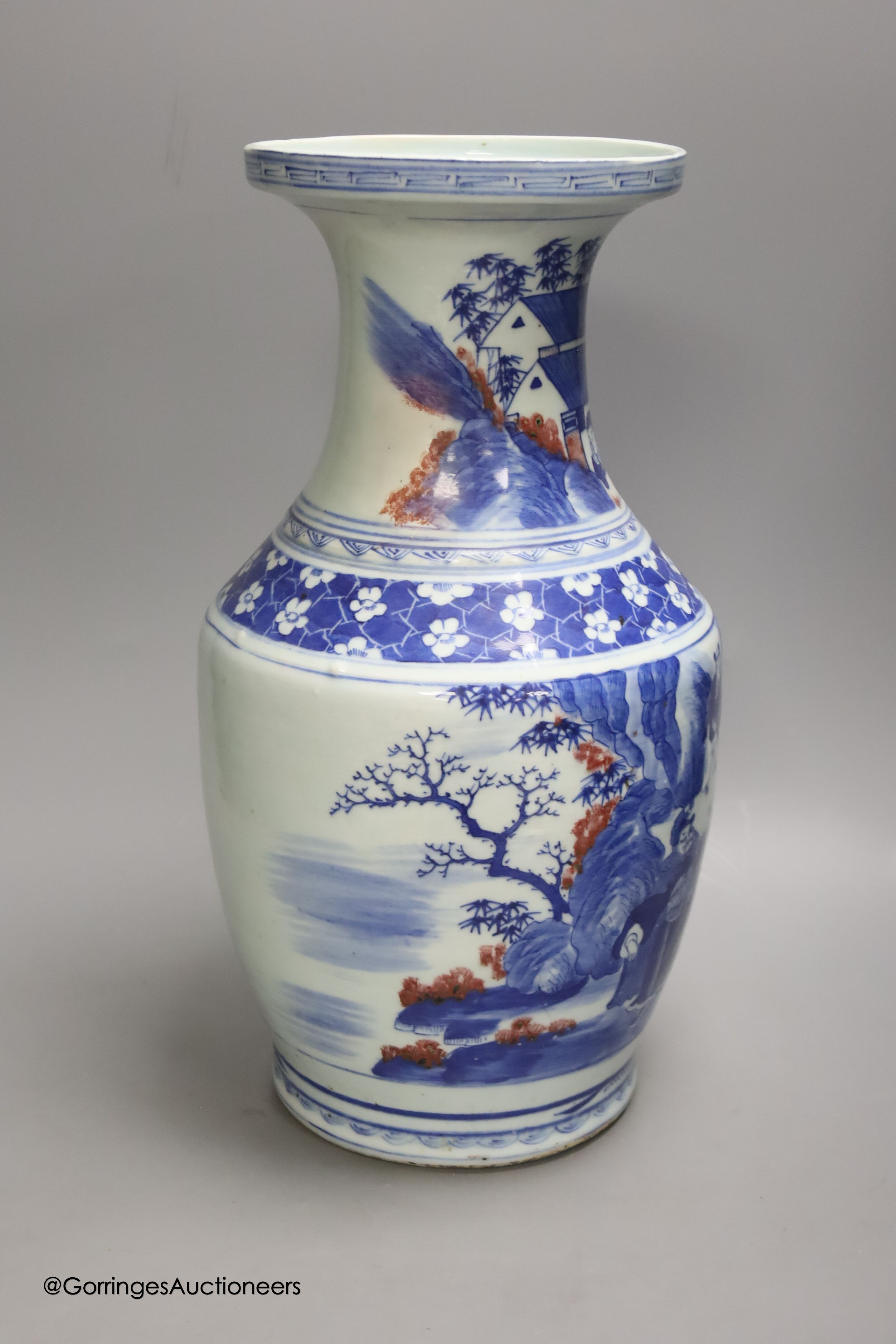 A large Chinese underglaze blue and copper red vase, height 41cm, restored neck